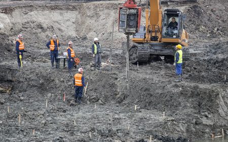 BELGRADE, SERBIA - OCTOBER 19, 2015: Engineers and soil technicians driling for standard penetration tests and sampling through soil. Site Investigations for the Belgrade Waterfront project.